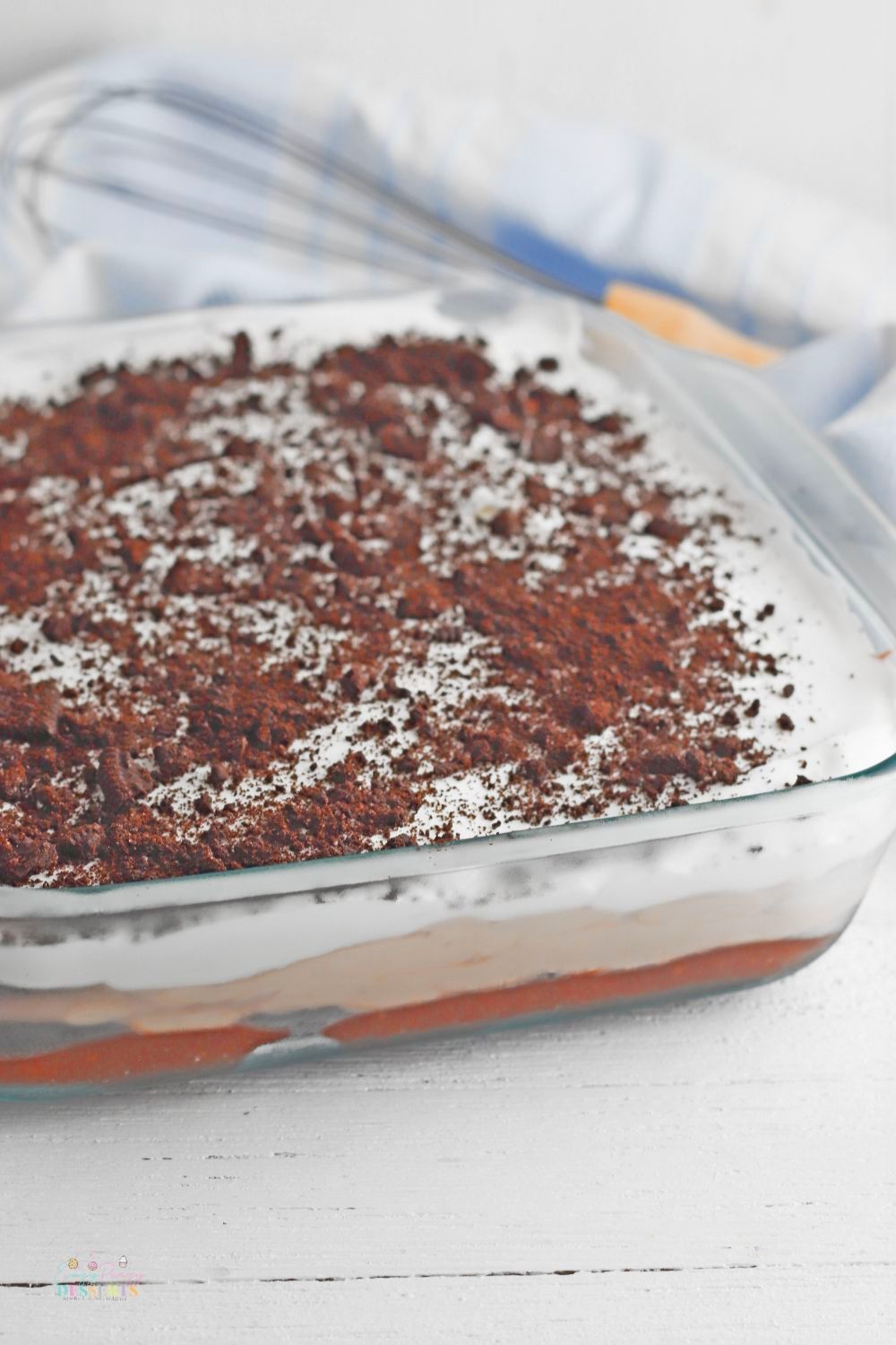 Image of no bake Oreo lasagna layered in a baking dish