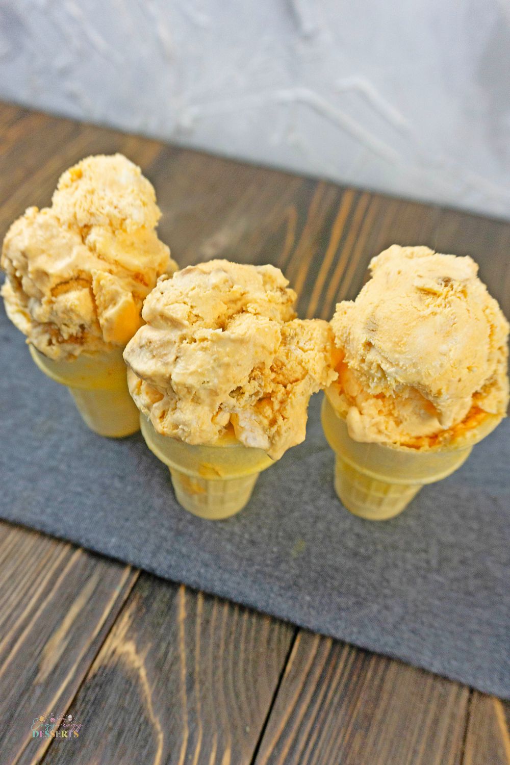 Image of pumpkin and gingersnap ice cream in ice cream cones
