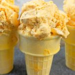 Close up image of homemade pumpkin ice cream in ice cream cones