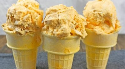 Pumpkin ice cream in three ice cream cones