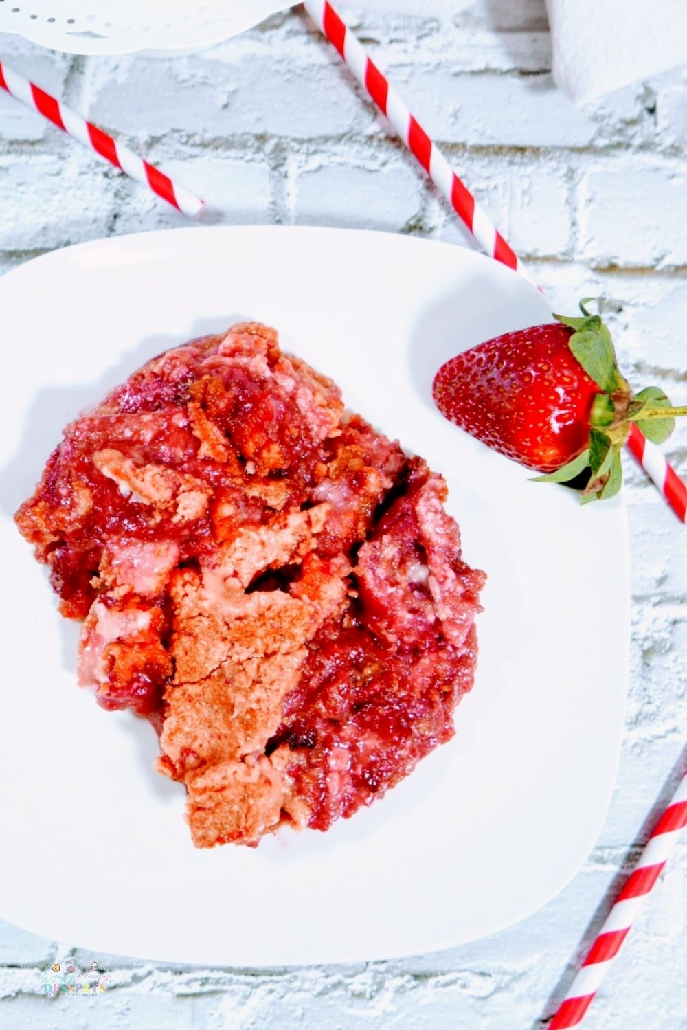 Image of strawberry crumble recipe in a white serving plate
