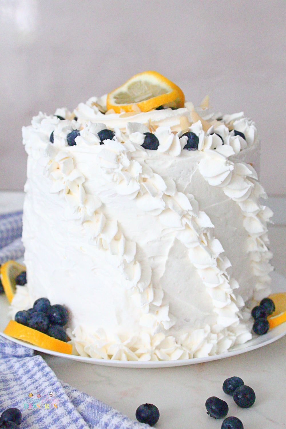 Lemon blueberry cake on a cake plate