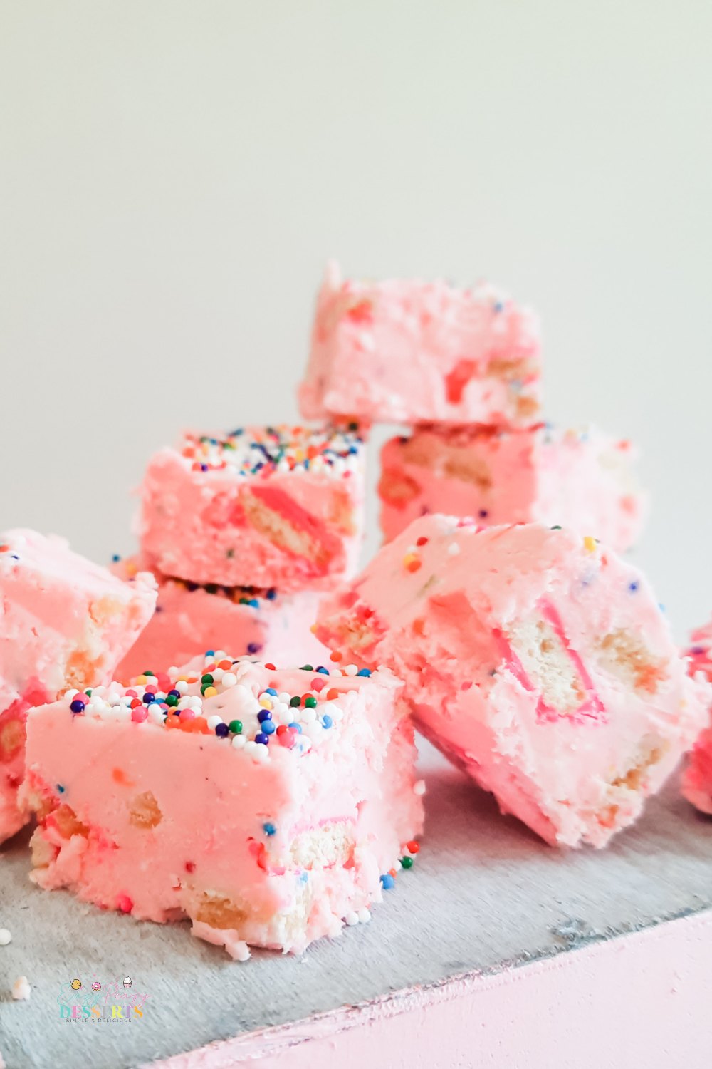 A few squares of strawberry funfetti fudge with circus cookies