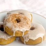 Close up image of pumpkin spice donuts with maple glaze