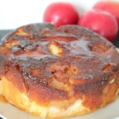 Close up image of apple upside down cake on a plate