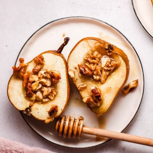 Over head image of bakes pears with honey cinnamon and pecans