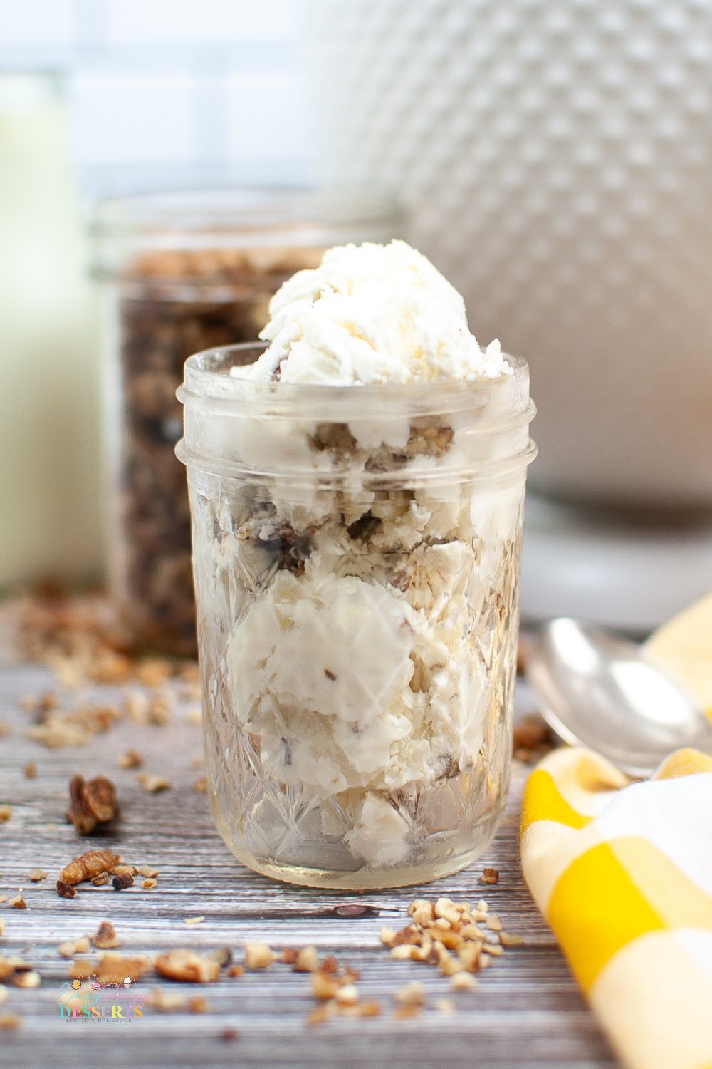 Front image of a jar filled with butter pecan ice cream