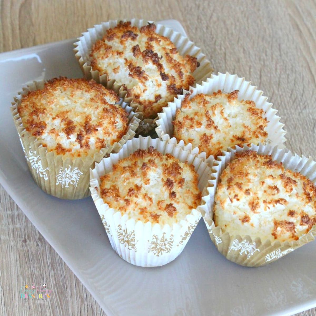 Close up image of easy coconut muffins on a dessert dish