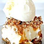 Cloe up image of ice cream sandwich made with caramel and pretzels and topped with vanilla ice cream