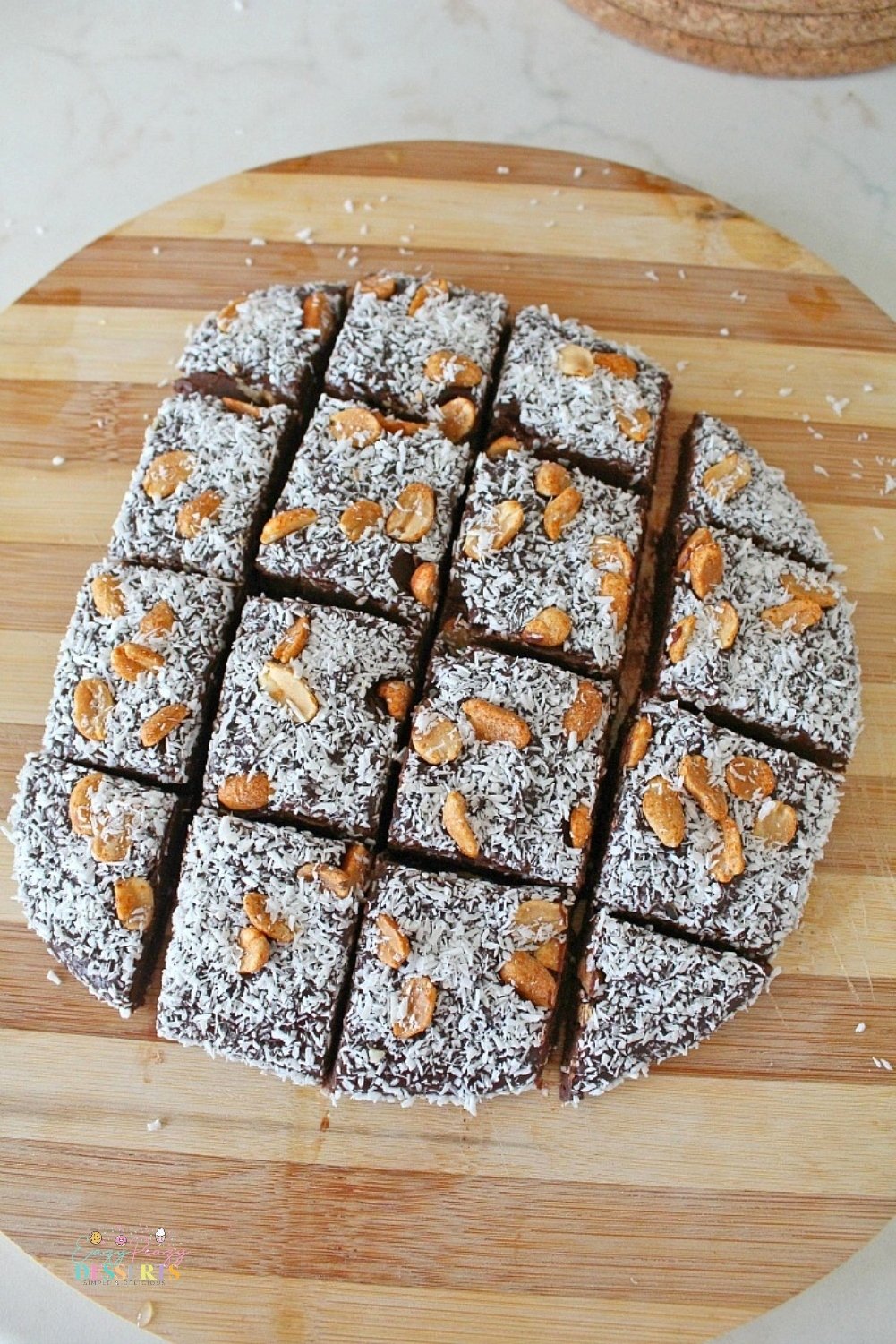 Over head image of microwave chocolate fudge decorated with coconut and nuts