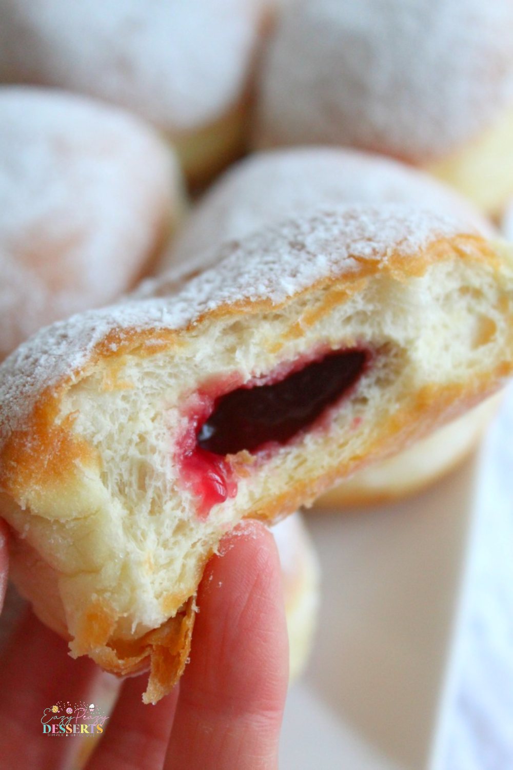 Close up image of strawberry jam donuts
