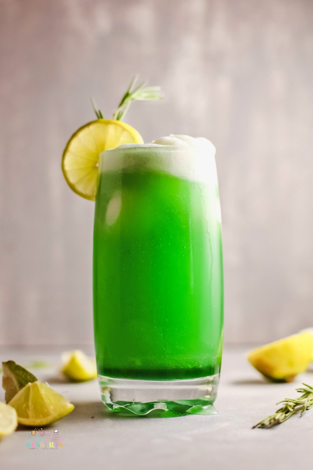 Image of a water glass filled with green St Patricks day punch