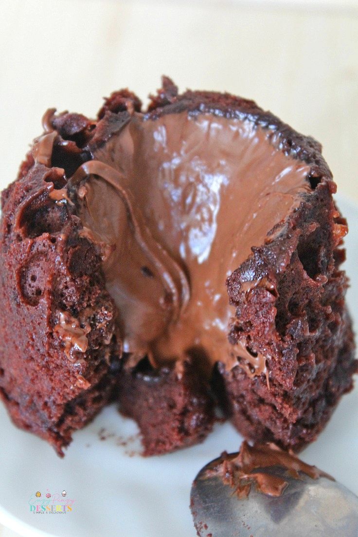 Close up image of a lava cake in a cup