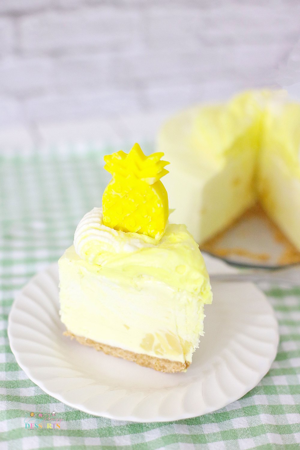 A slice of pineapple whip cheesecake