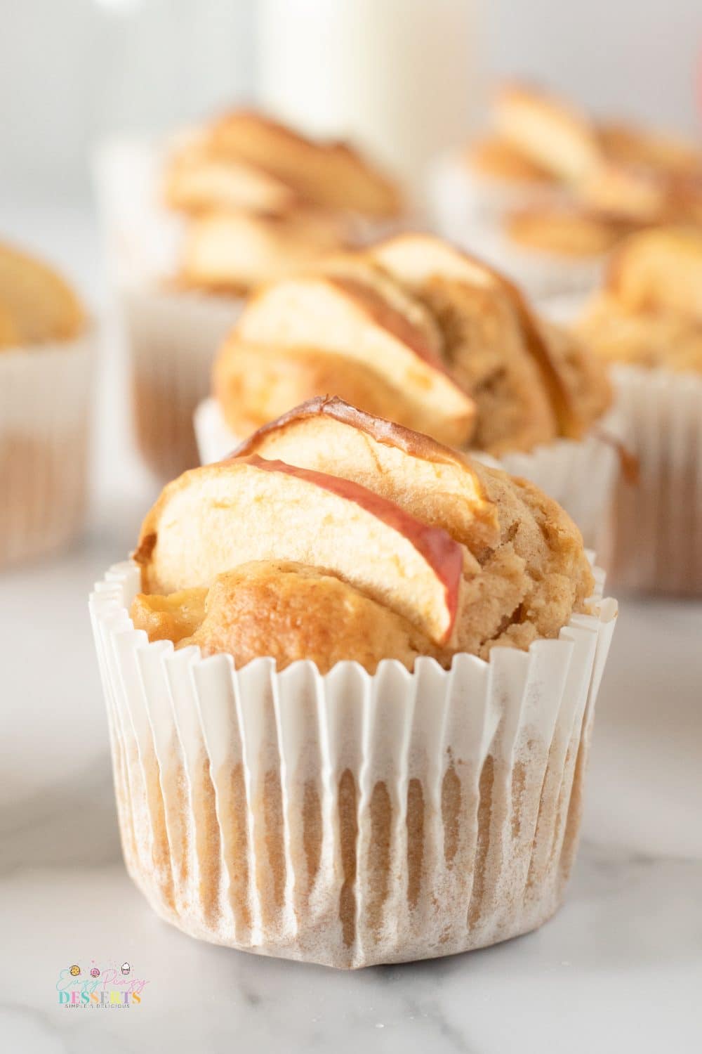 Front image of a muffin made with a homemade apple muffins recipe