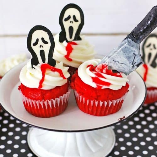 Easy Halloween cupcakes decorated with chocolate scream faces and knives