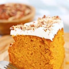 Close up image of a slice of air fryer cake with pumpkin