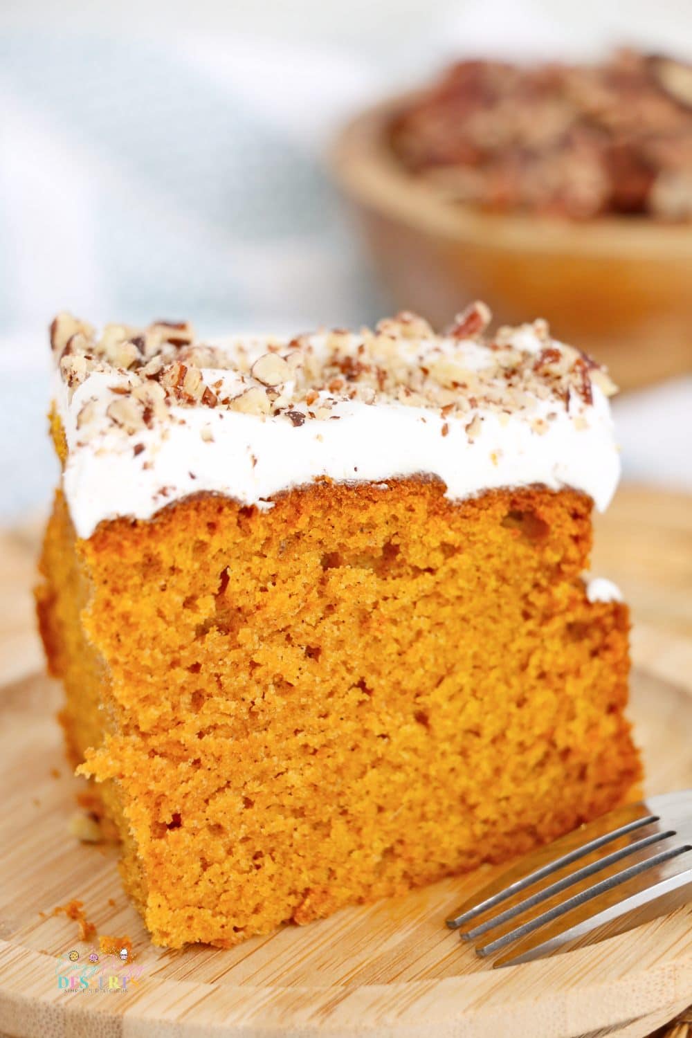 A slice of pumpkin cake made with a pumpkin cake recipe for air fryer