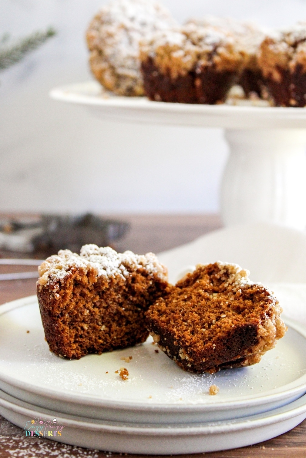 Ginger streusel muffins cut in half to expose the inside