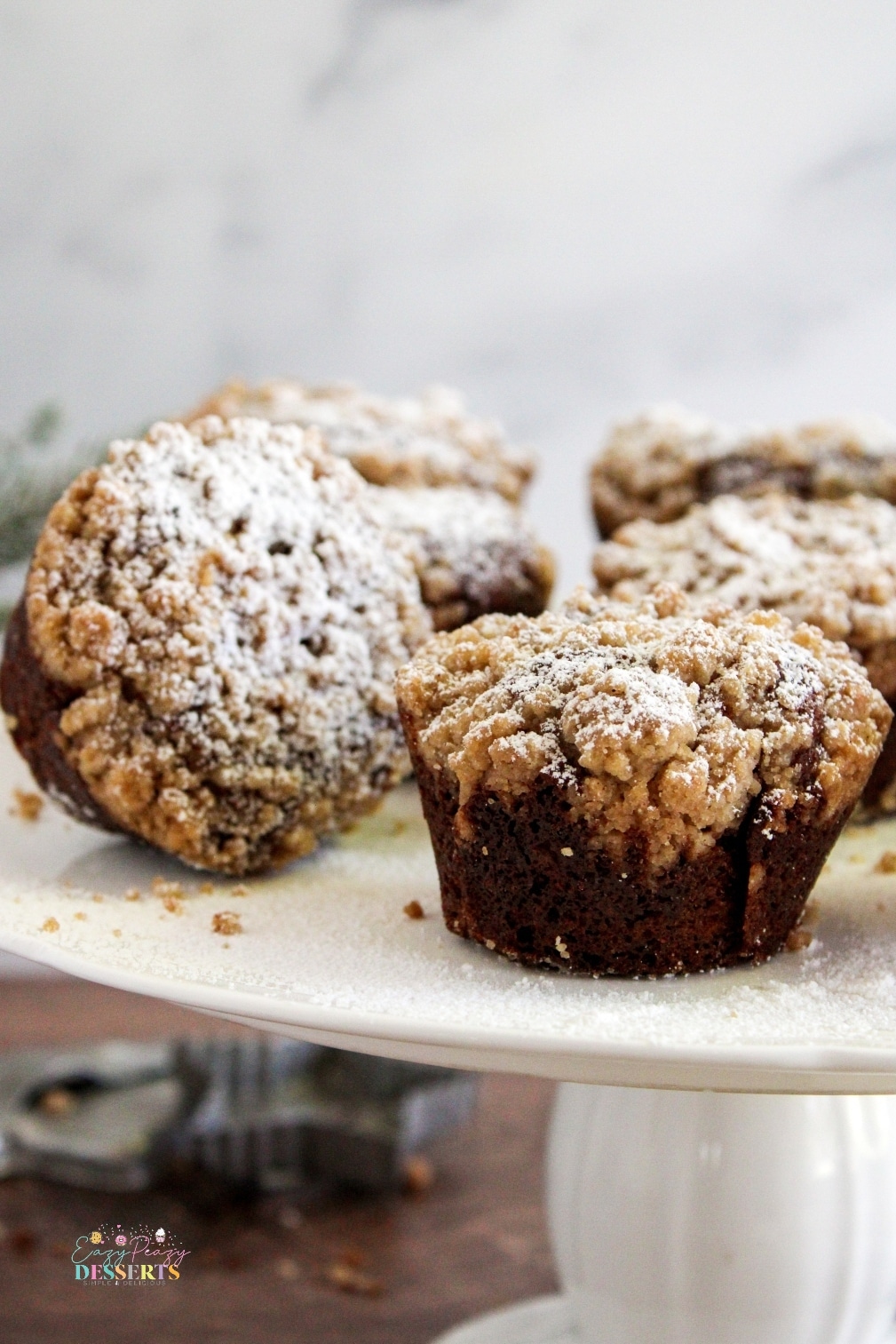 Close up image of gingerbread streusel muffins with molasses
